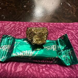 Peridot gold toned cocktail ring.